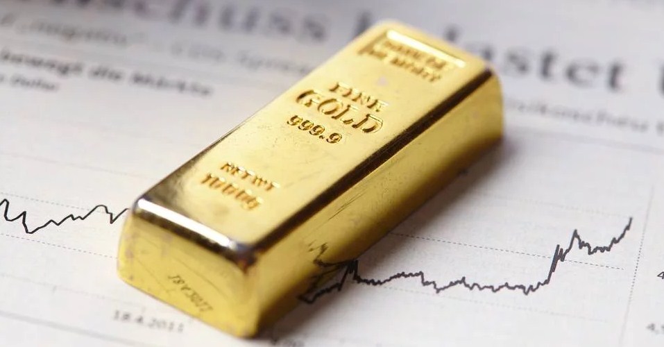 Komentar Fed Tahan Suku Bunga, Harga Emas Flat Usai Turun 2 Pekan